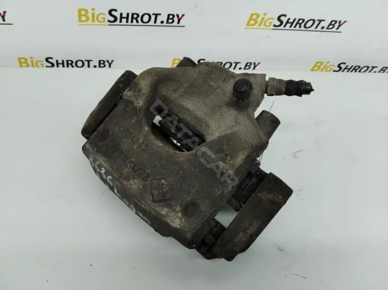 Суппорт тормозной 10111089