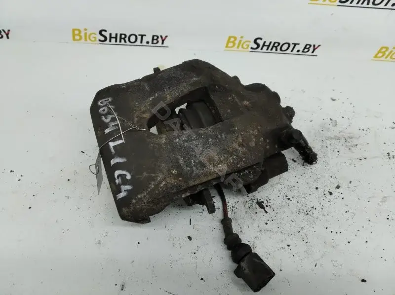 Суппорт тормозной 10111086