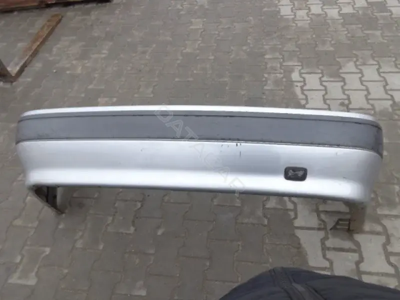 Задний бампер 10099256