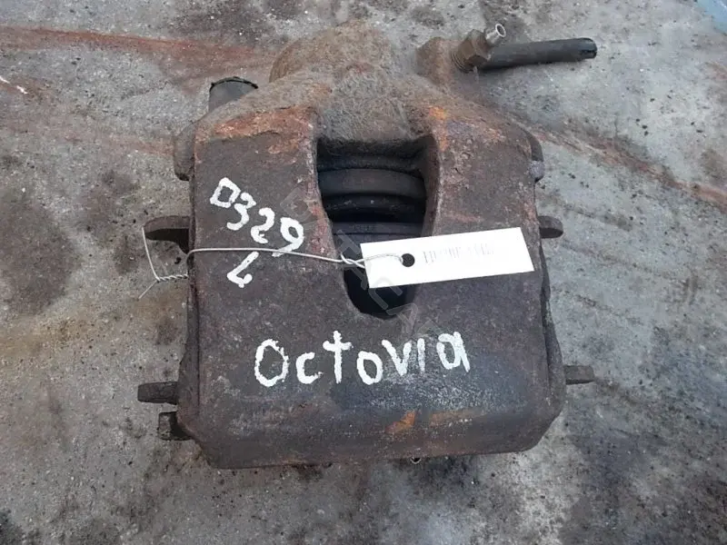 Суппорт тормозной 10044467