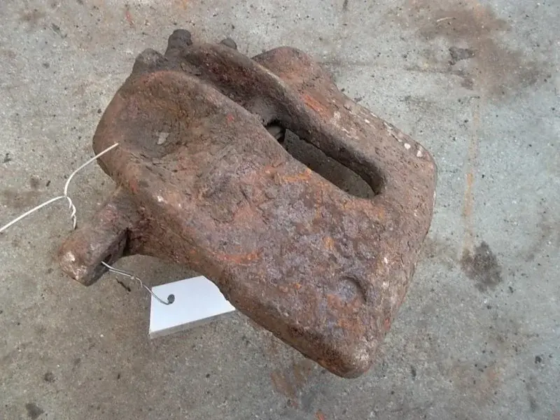 Суппорт тормозной 10043916