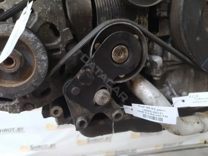 Натяжитель ремня генератора 07L903133