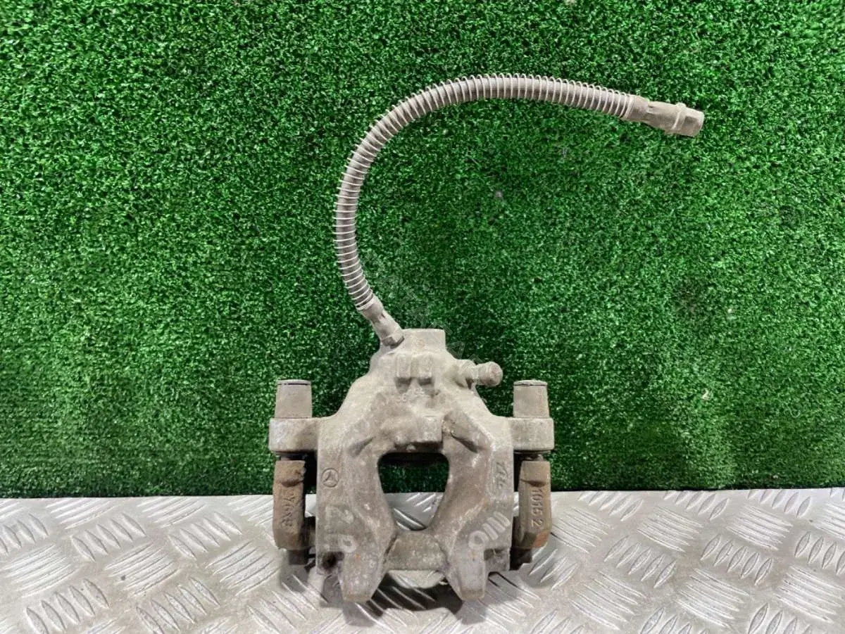 Суппорт тормозной 64114783