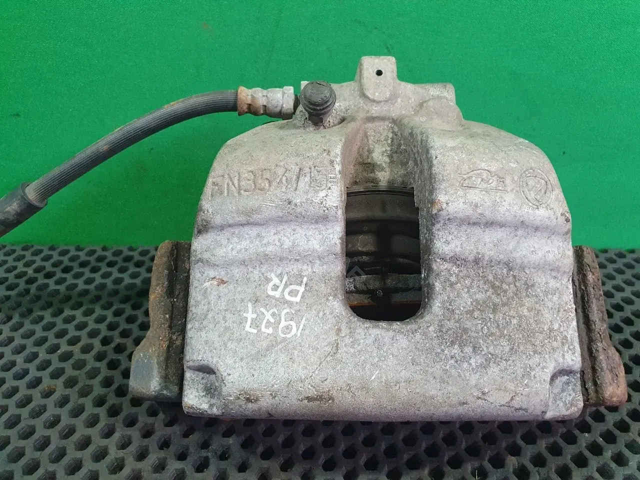 Суппорт тормозной FN354 15