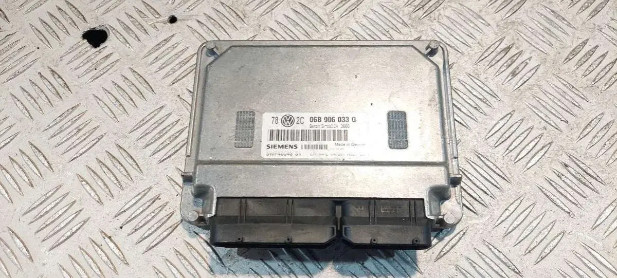Блок управления двигателем 06B906033G