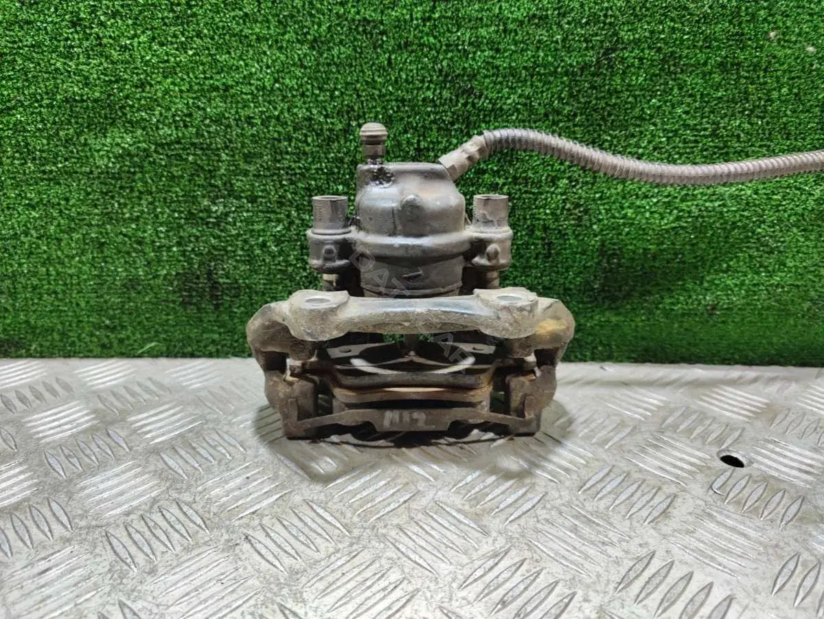 Суппорт тормозной 64782073