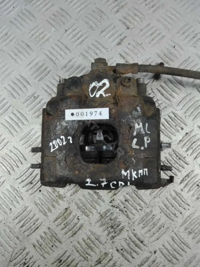 Суппорт тормозной 001974