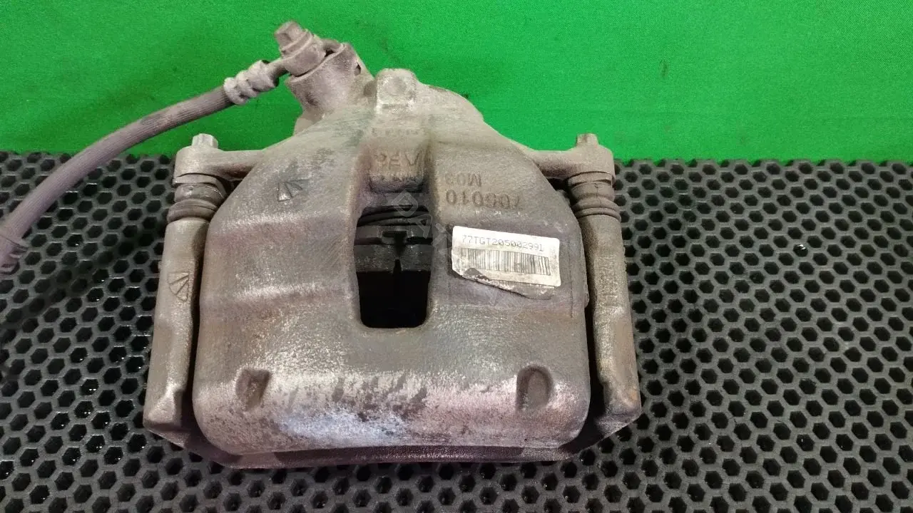 Суппорт тормозной 77TGT20500299D