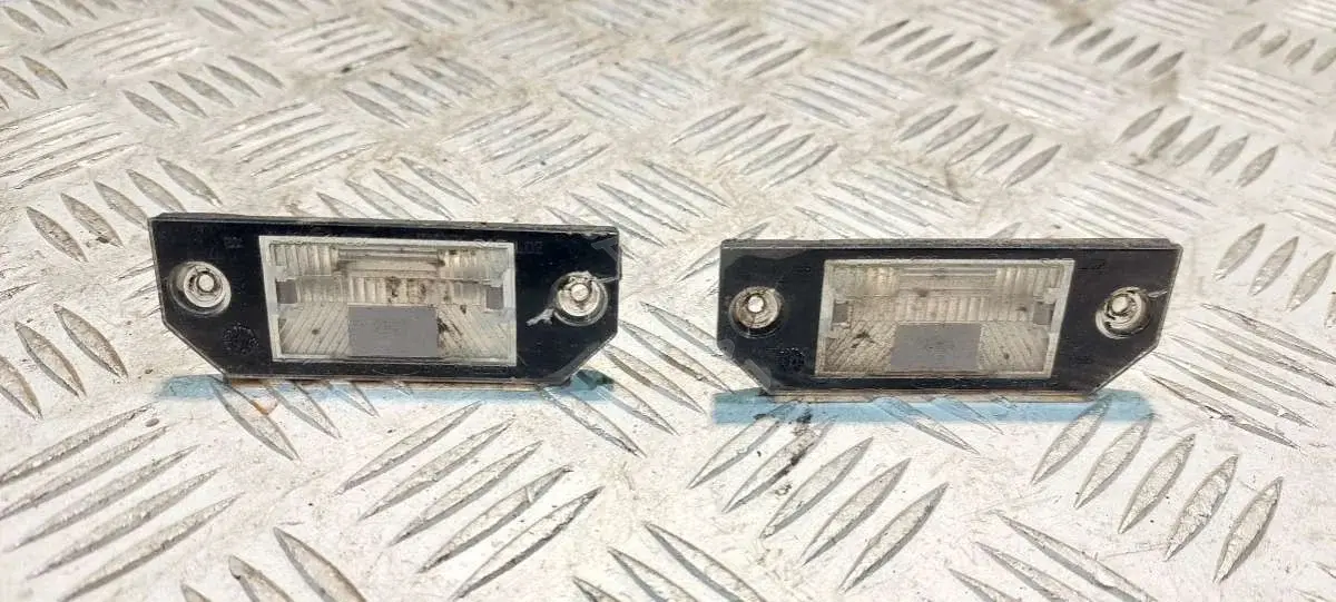 Фонарь подсветки номерного знака 3M5A13550A