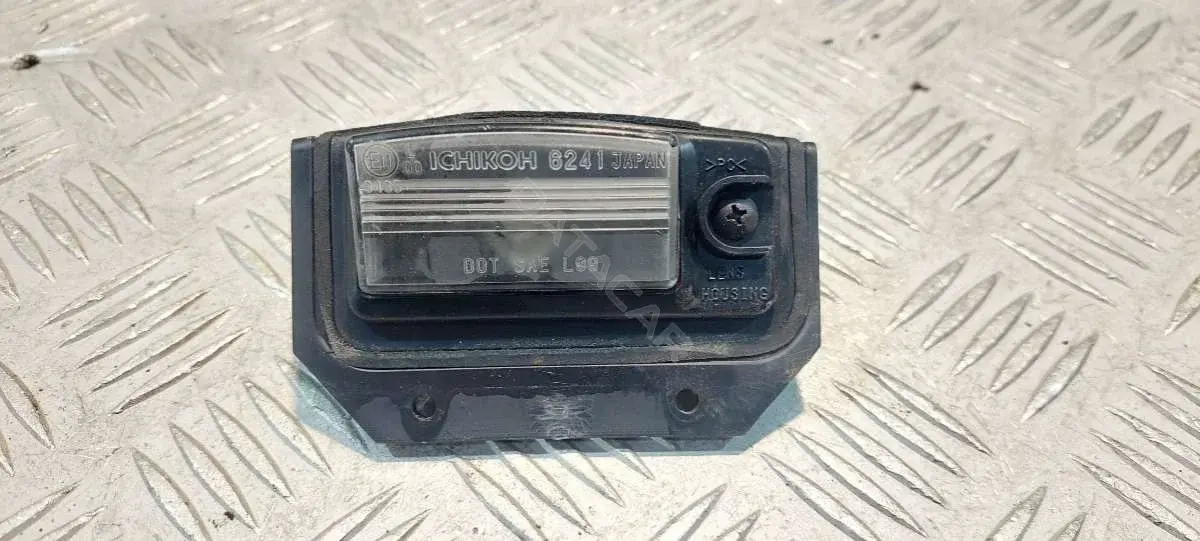 Фонарь подсветки номерного знака 90163CA000