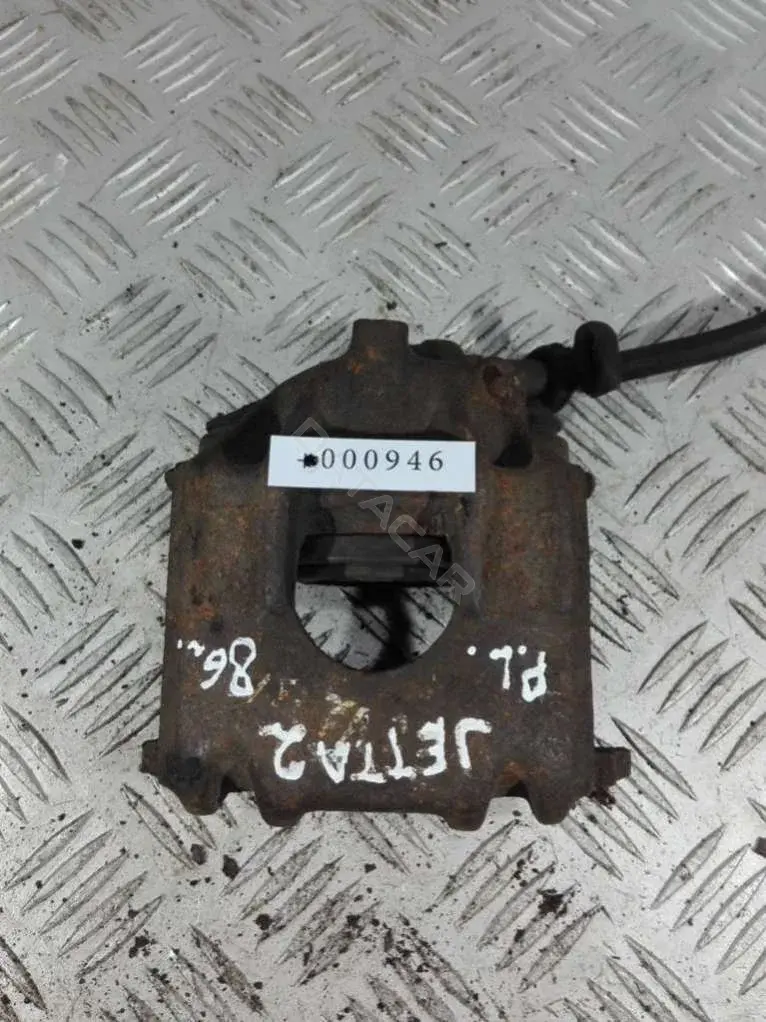 Суппорт тормозной 000946