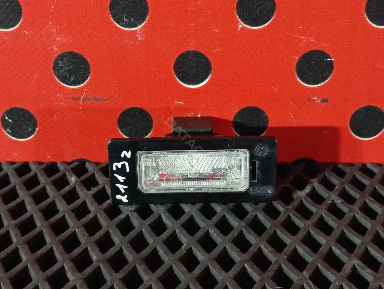 Фонарь подсветки номерного знака 8T0 943 021