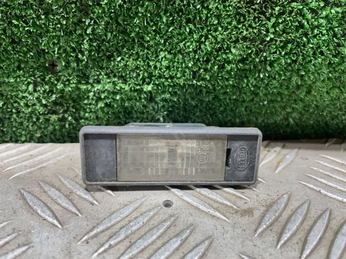 Фонарь подсветки номерного знака 2KA 008 224