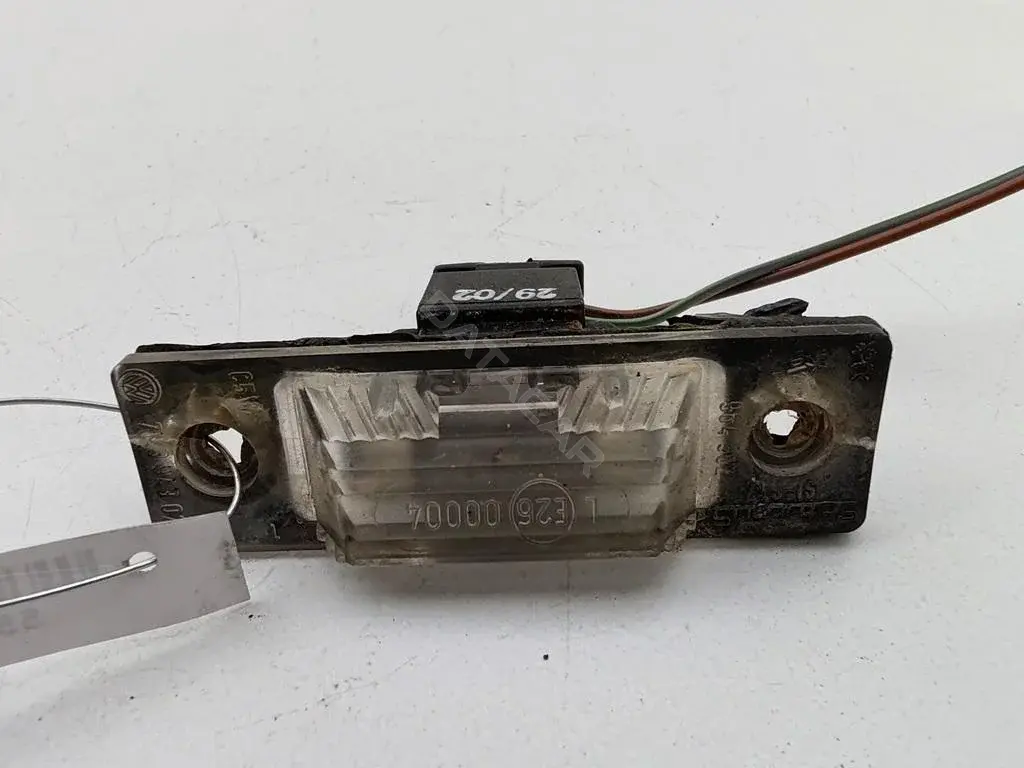 Фонарь подсветки номерного знака 7M3943021A