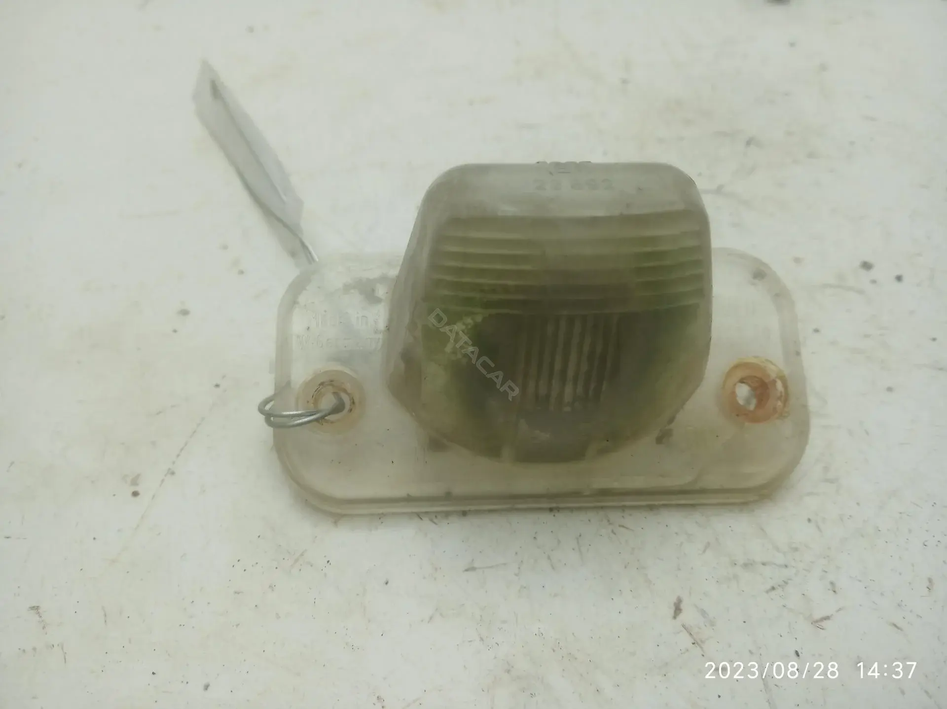 Фонарь подсветки номерного знака 75370
