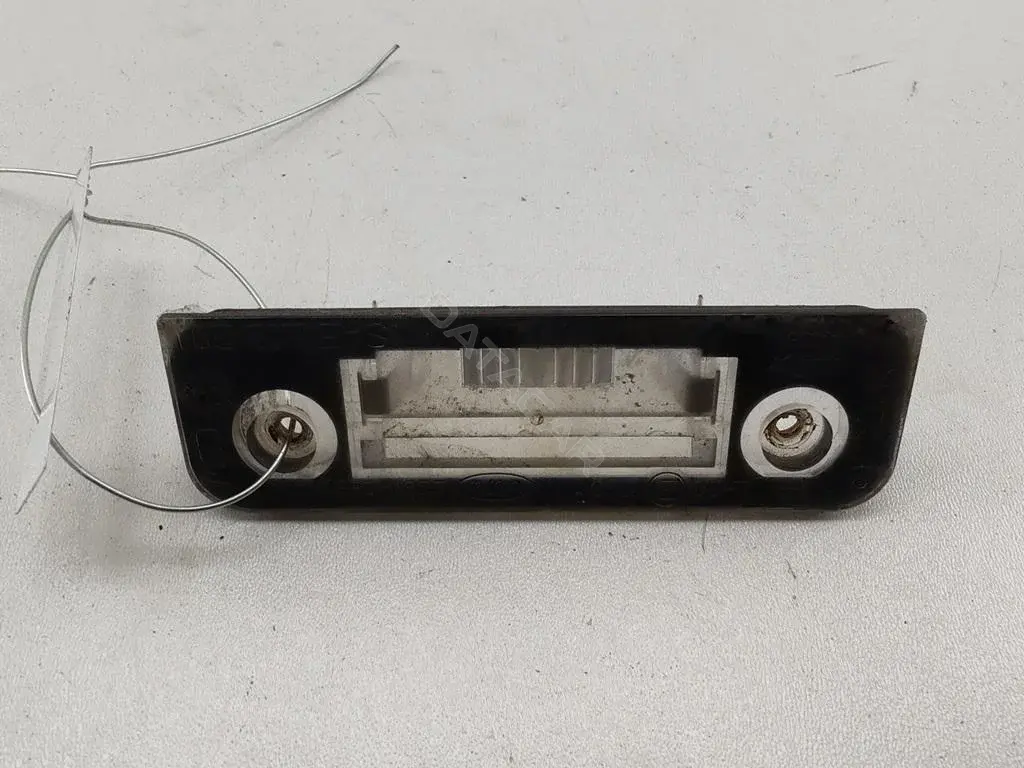 Фонарь подсветки номерного знака 2S6113550AA