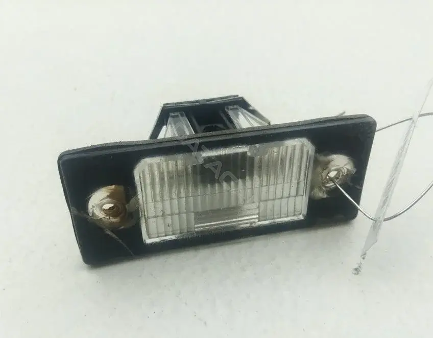 Фонарь подсветки номерного знака 1J5943021