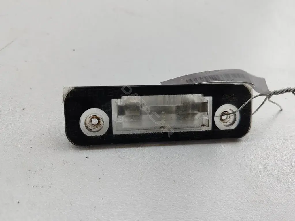 Фонарь подсветки номерного знака 2S6113550AA