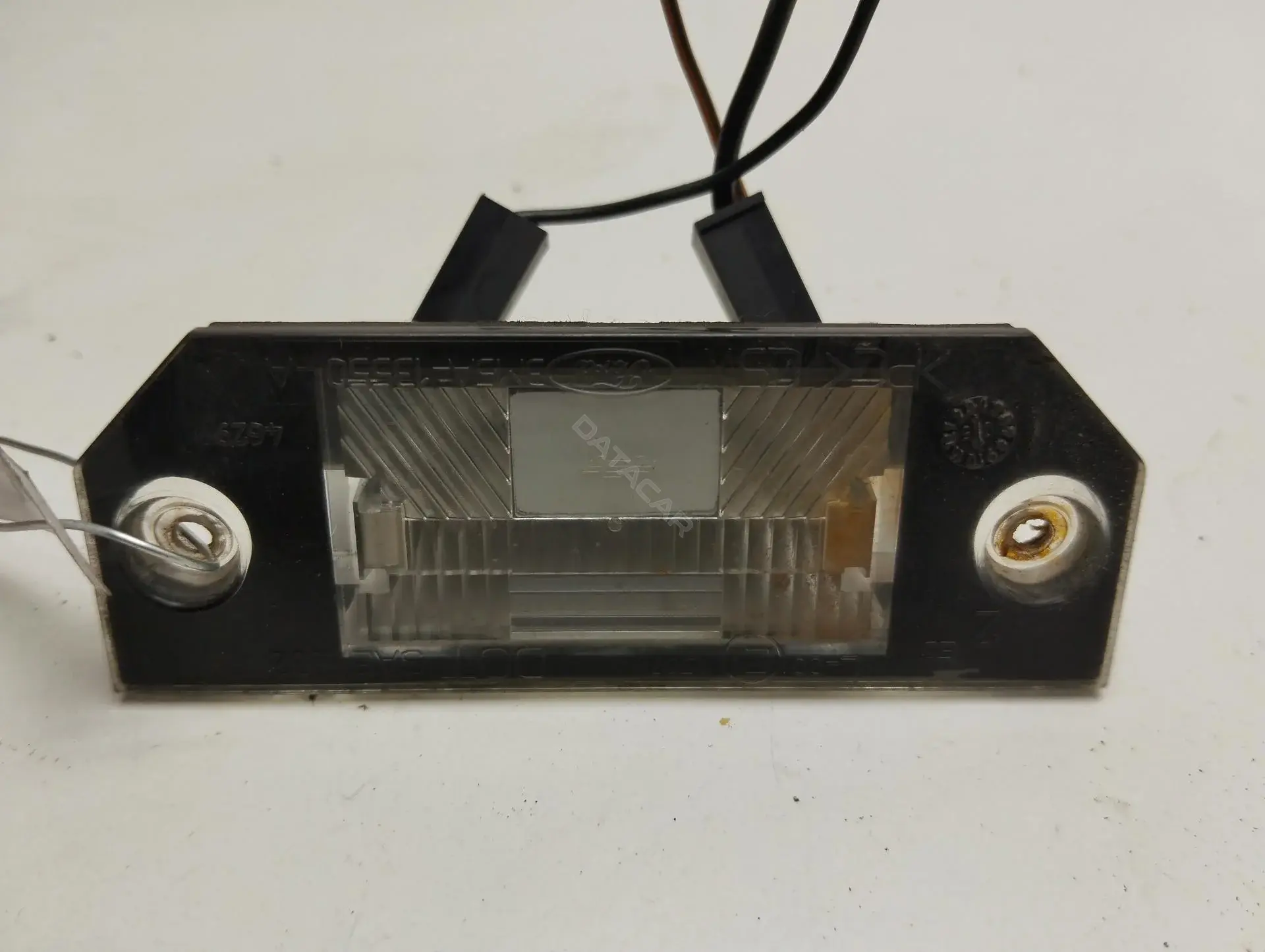 Фонарь подсветки номерного знака 3M5A13550