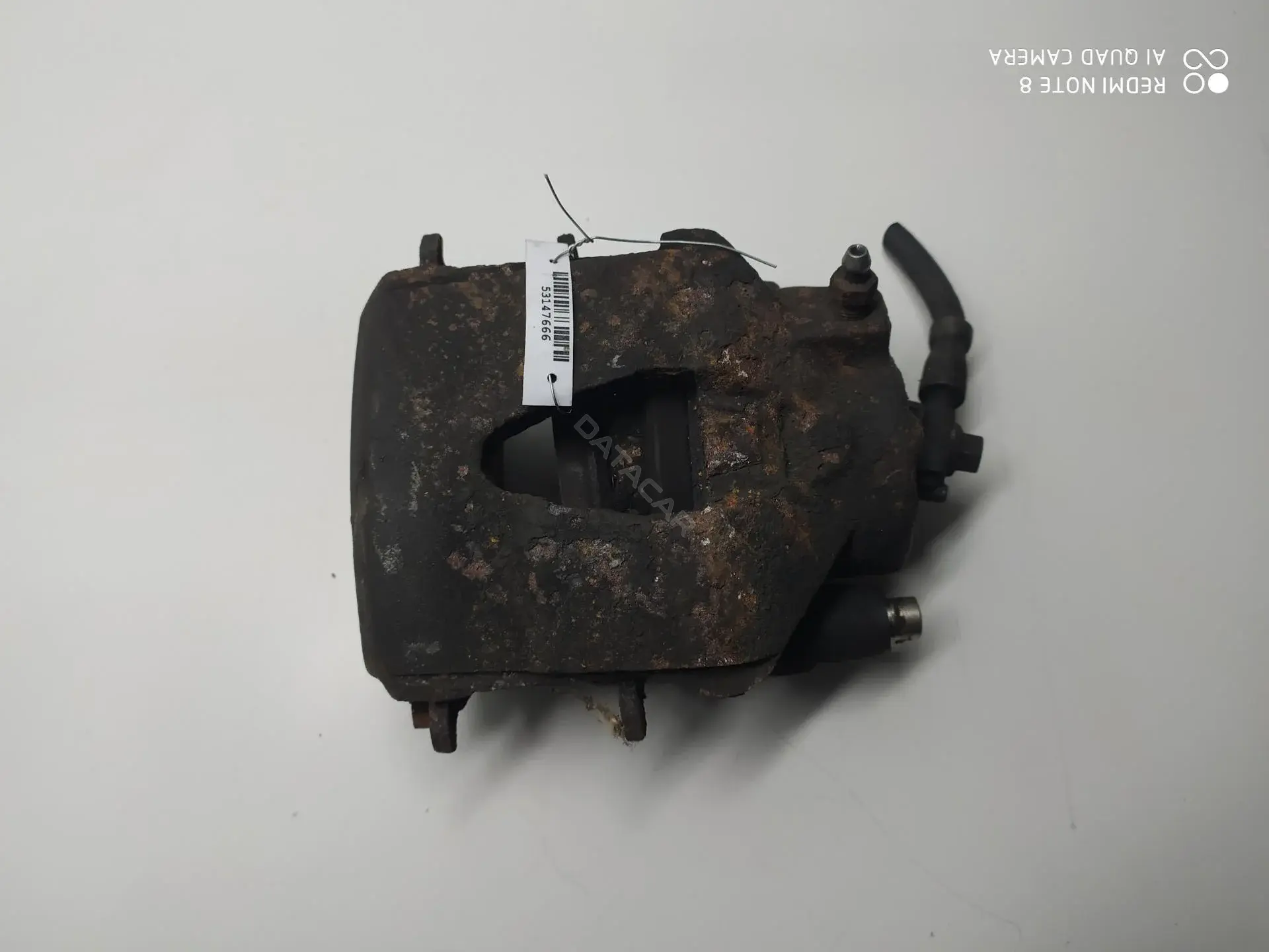 Суппорт тормозной 1K0615124D