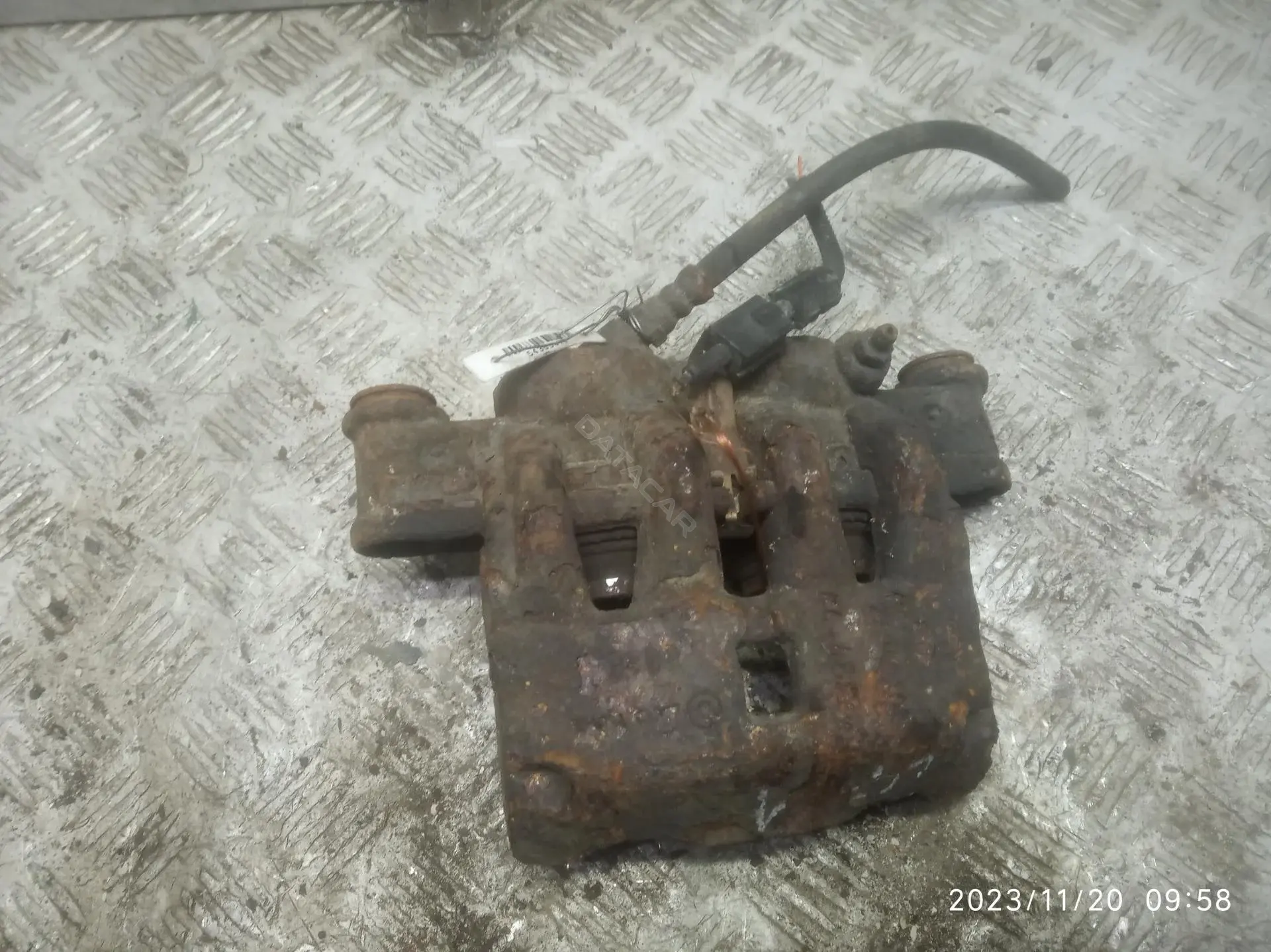 Суппорт тормозной 54355477