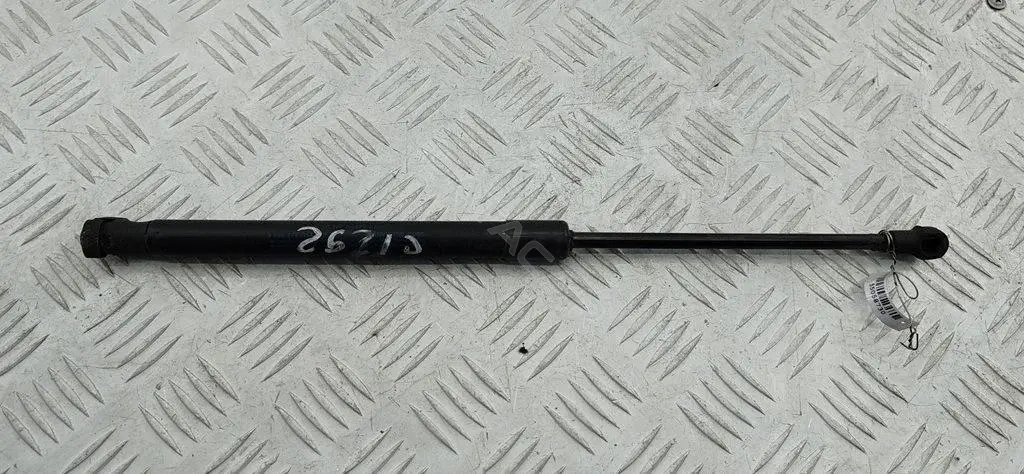 Амортизатор крышки багажника, капота, заднего стекла 1T0823359A