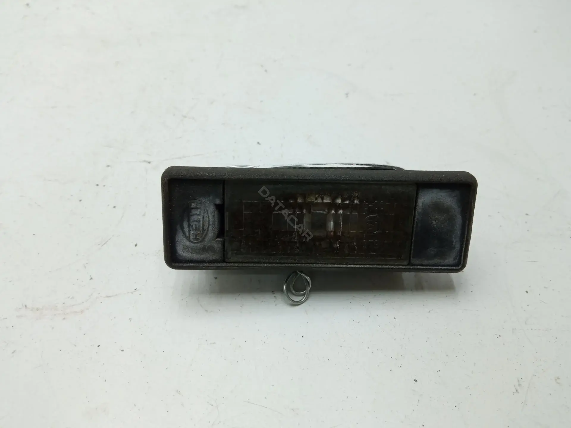Фонарь подсветки номерного знака 2KA008224