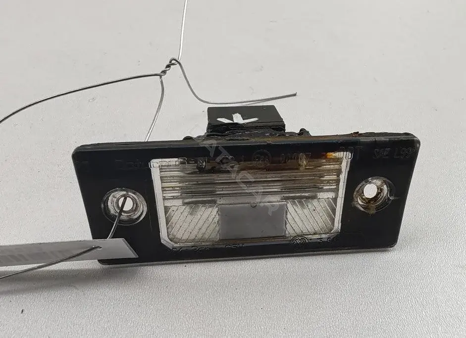 Фонарь подсветки номерного знака 1J5943021A