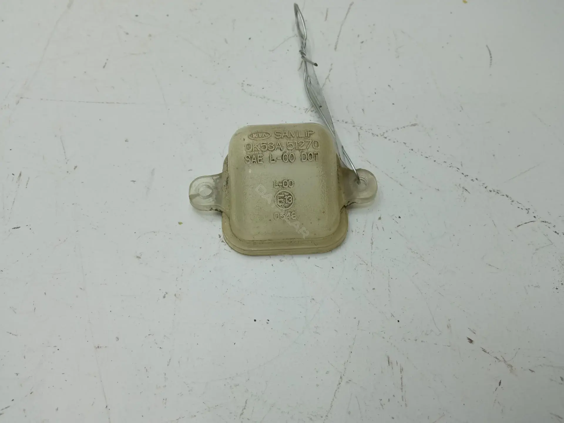 Фонарь подсветки номерного знака OK53A51270