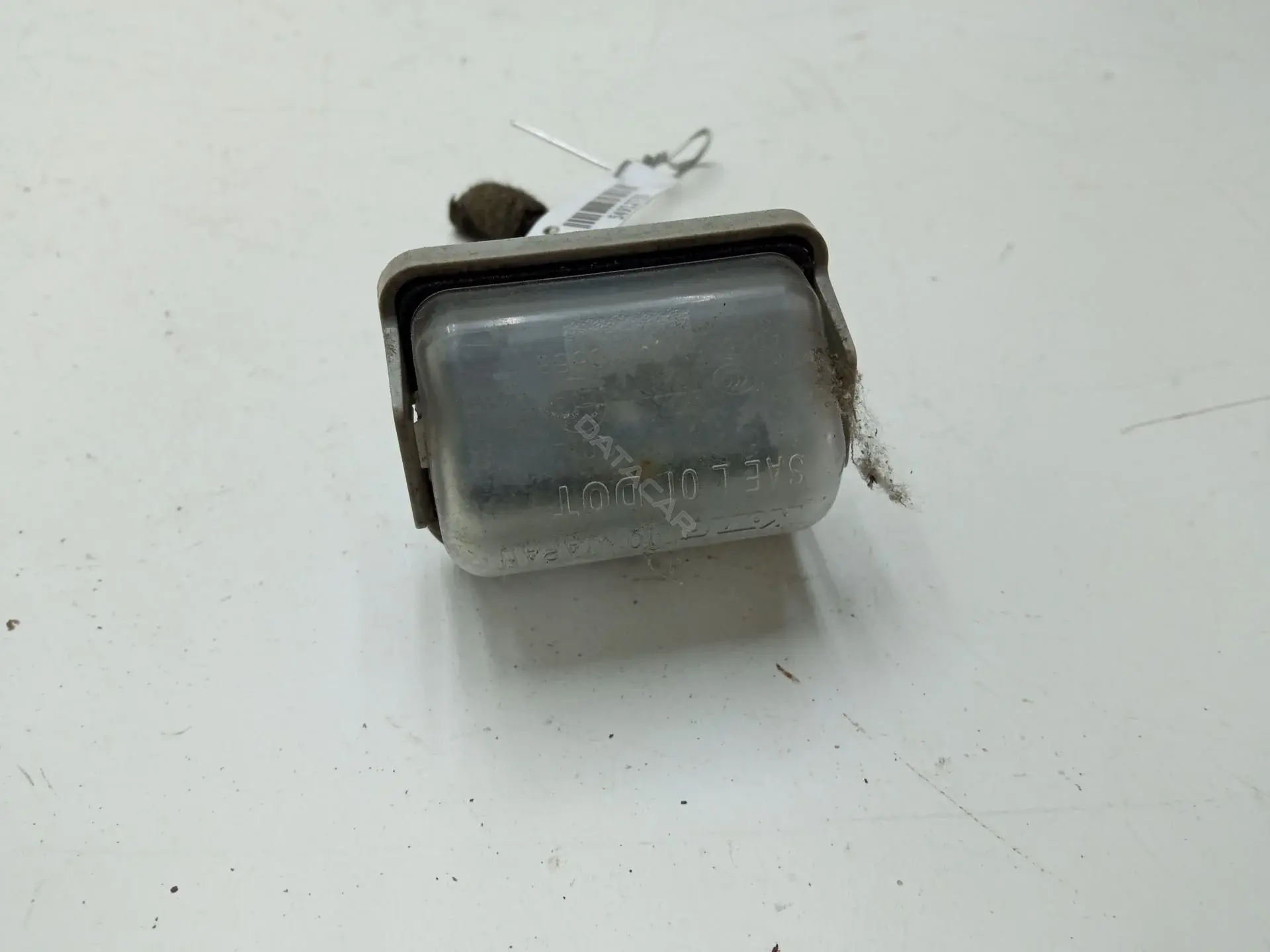 Фонарь подсветки номерного знака A045053
