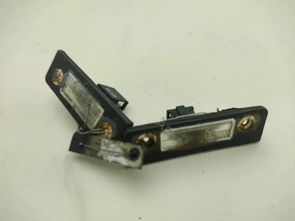 Фонарь подсветки номерного знака 1Z0943021
