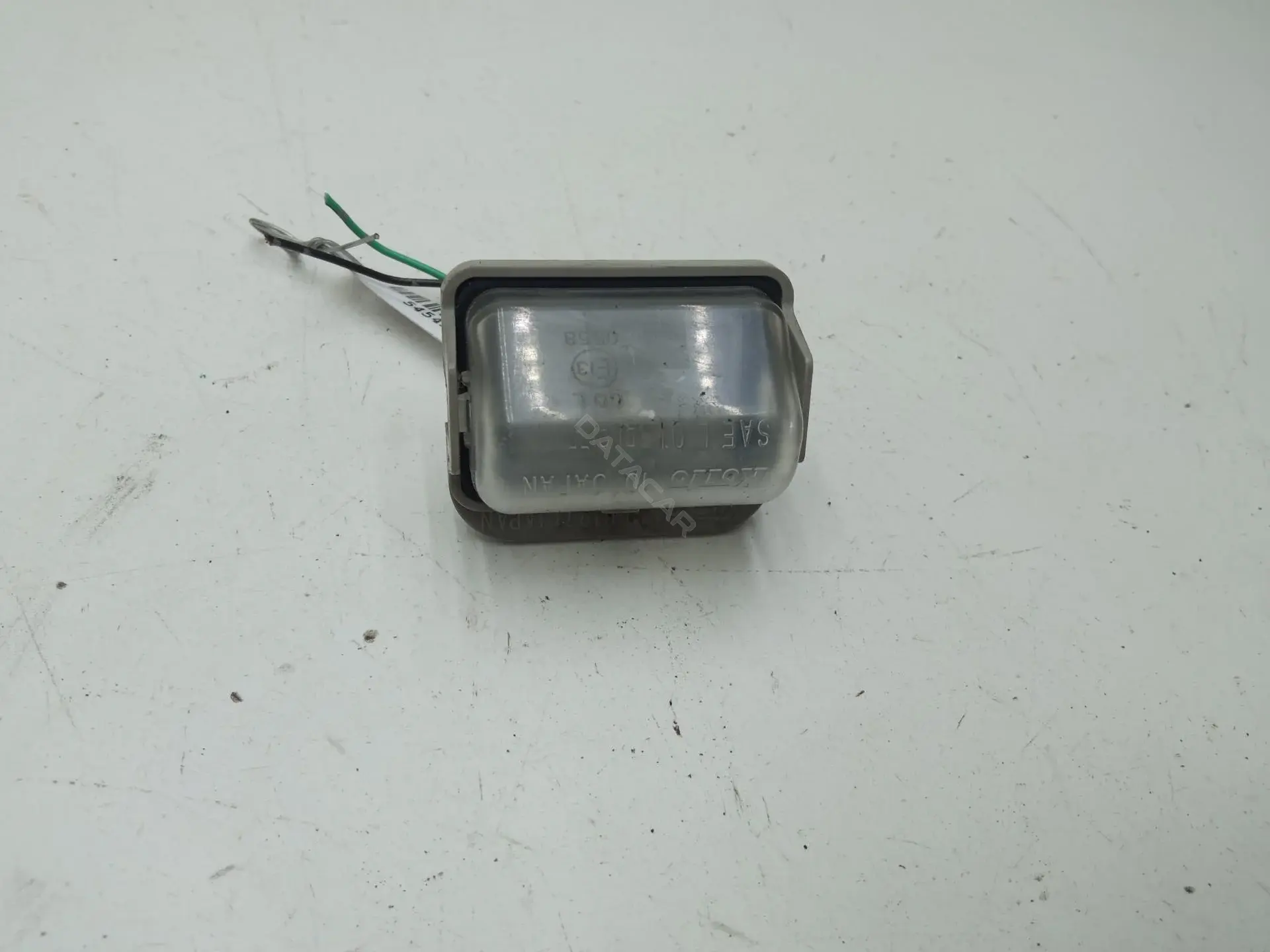 Фонарь подсветки номерного знака GJ6A-51-270C