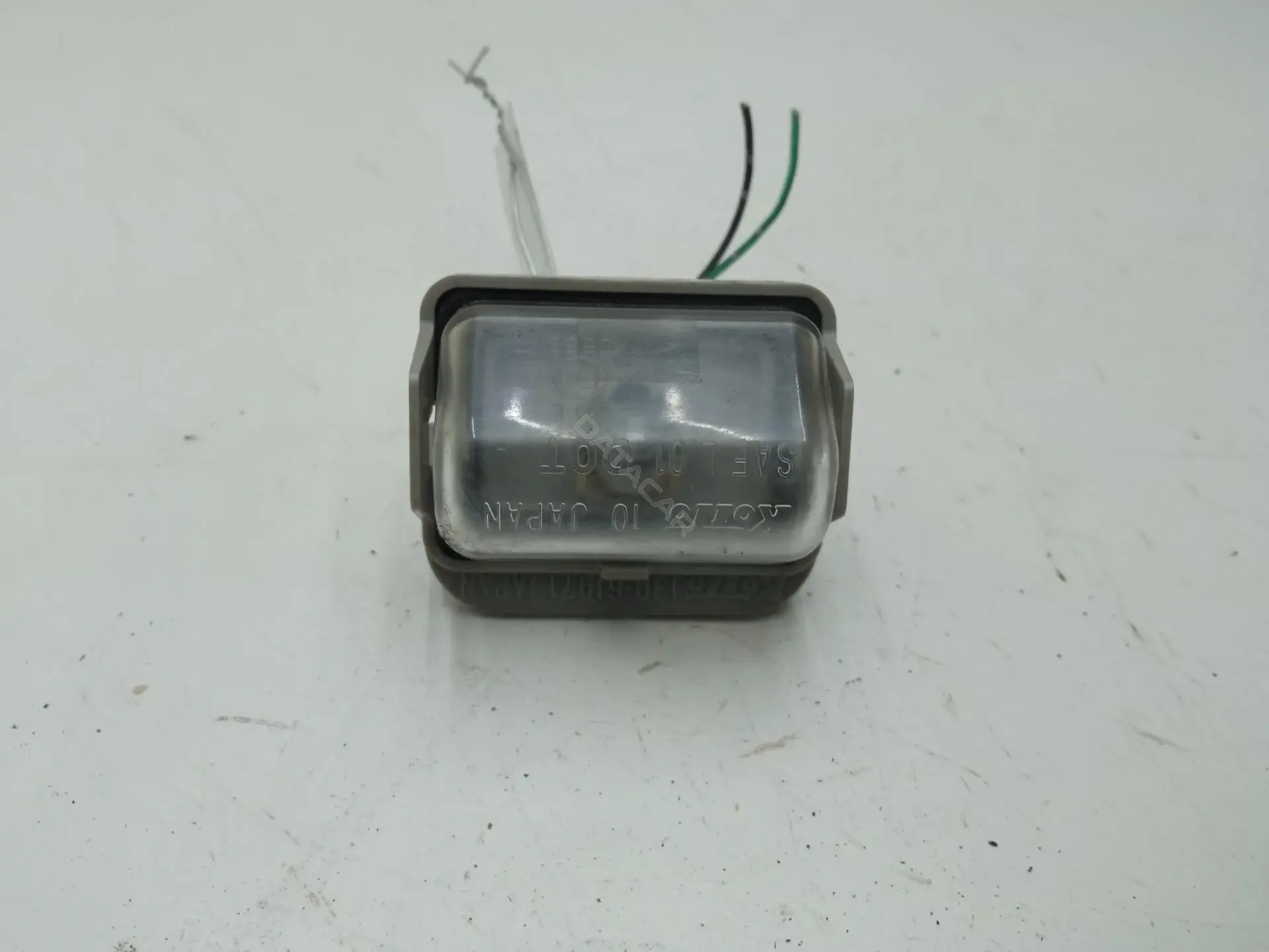 Фонарь подсветки номерного знака GJ6A-51-270C