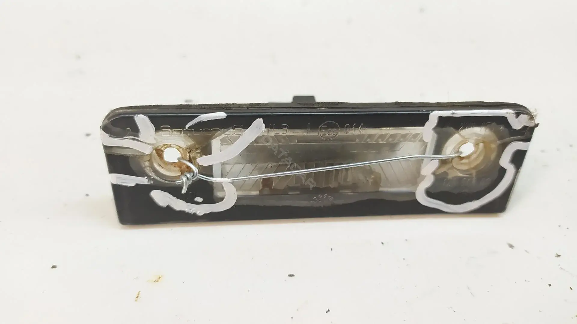 Фонарь подсветки номерного знака 1Z0943021