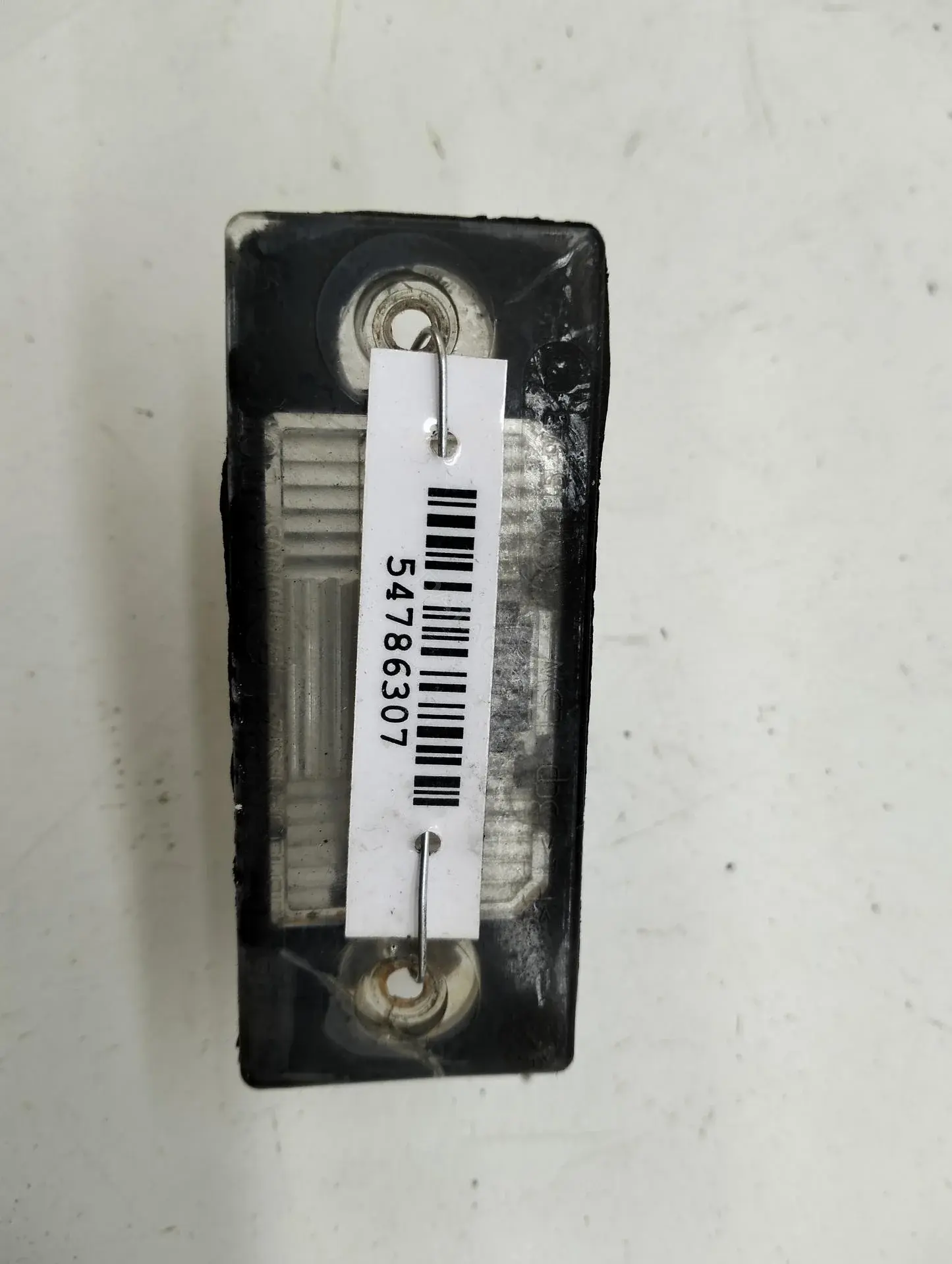 Фонарь подсветки номерного знака 1J5943021