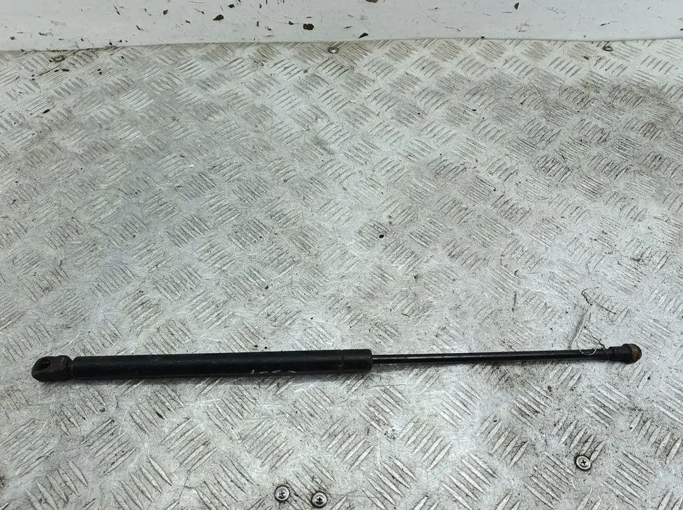 Амортизатор крышки багажника, капота, заднего стекла 1j0823359