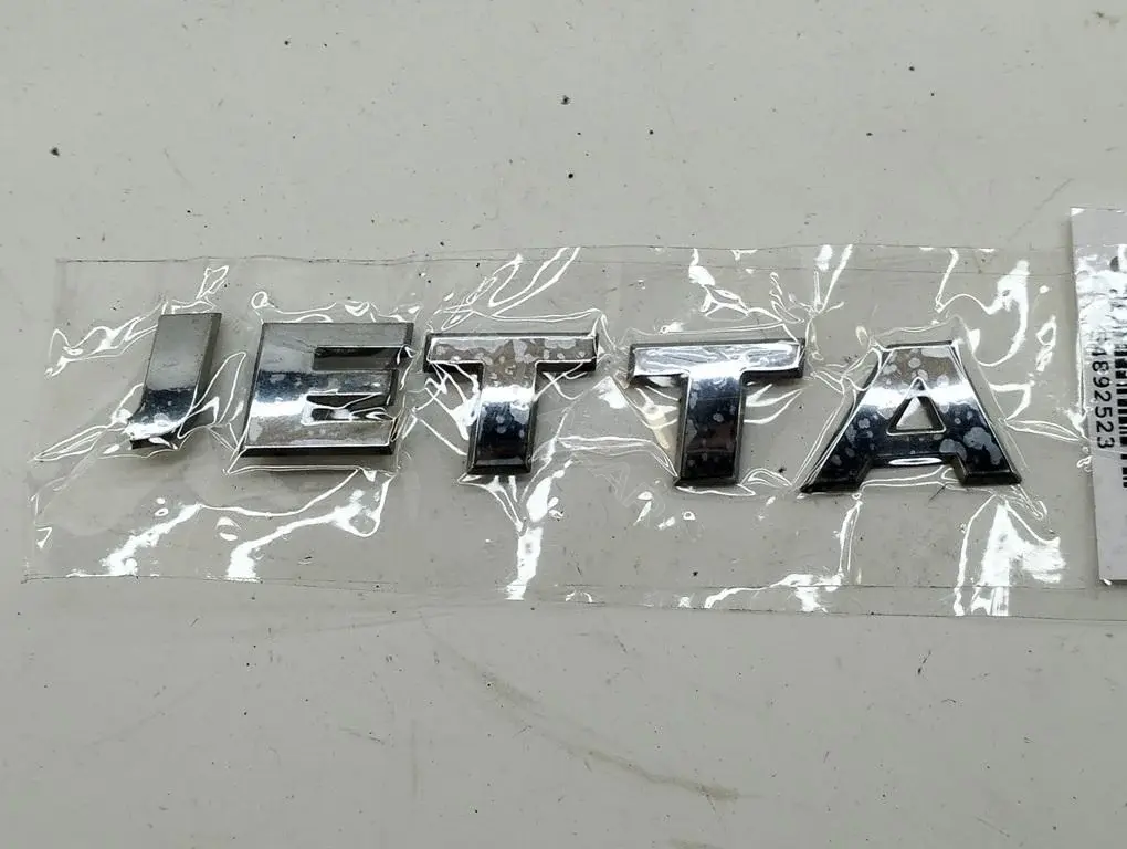 Эмблема JETTA
