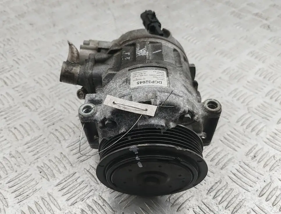 Компрессор кондиционера DCP32045