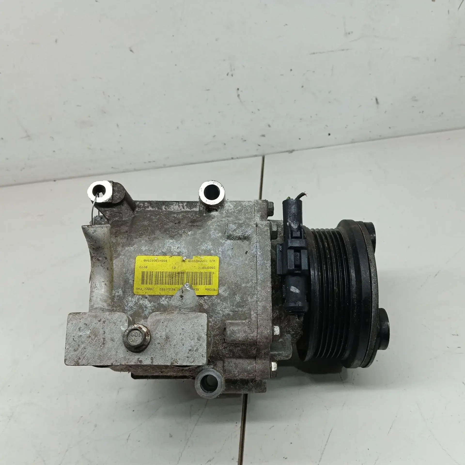 Компрессор кондиционера 6S6H19D629AB