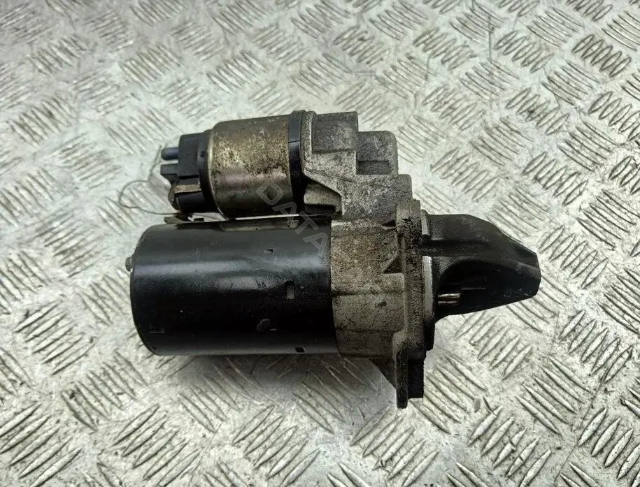 Стартер 0001107522, 55578921