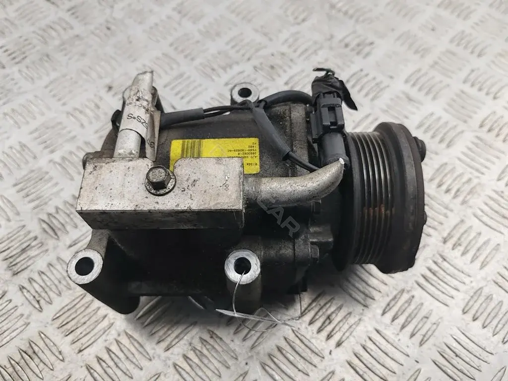 Компрессор кондиционера YS4H-19D629-AC