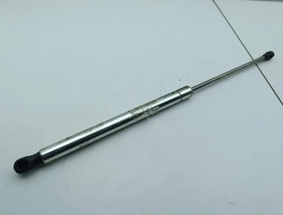 Амортизатор крышки багажника, капота, заднего стекла 1J0823359