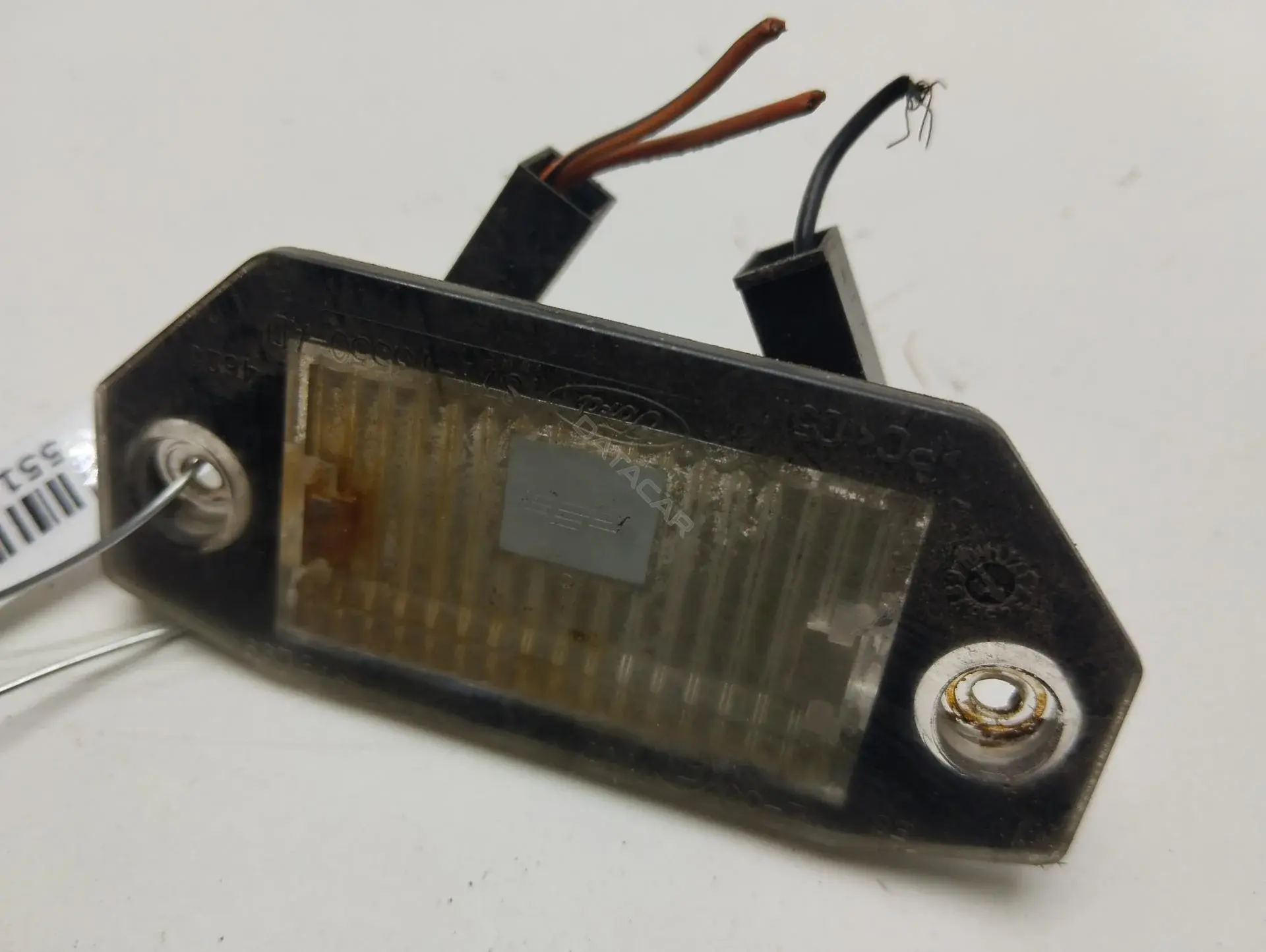 Фонарь подсветки номерного знака 1S7113550A