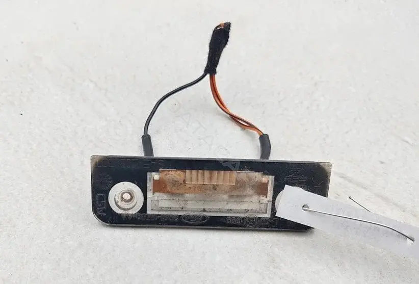 Фонарь подсветки номерного знака S6113550AA