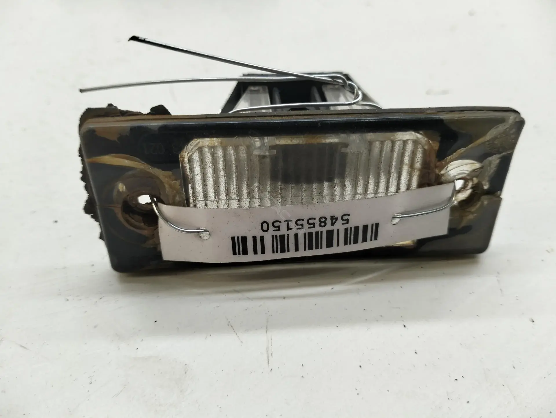 Фонарь подсветки номерного знака 1J5943021