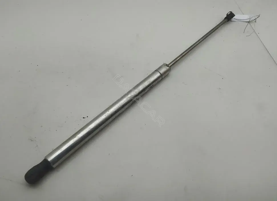 Амортизатор крышки багажника, капота, заднего стекла 1J0823359D