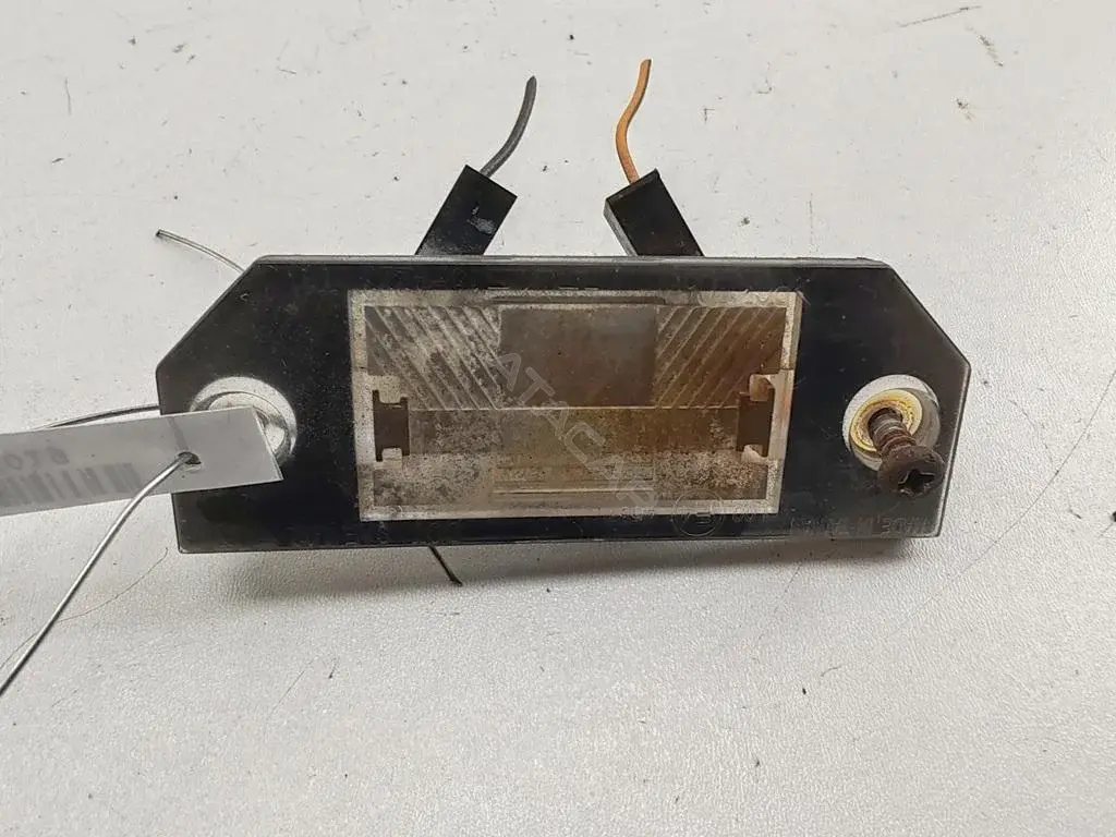 Фонарь подсветки номерного знака 3M5A13550A