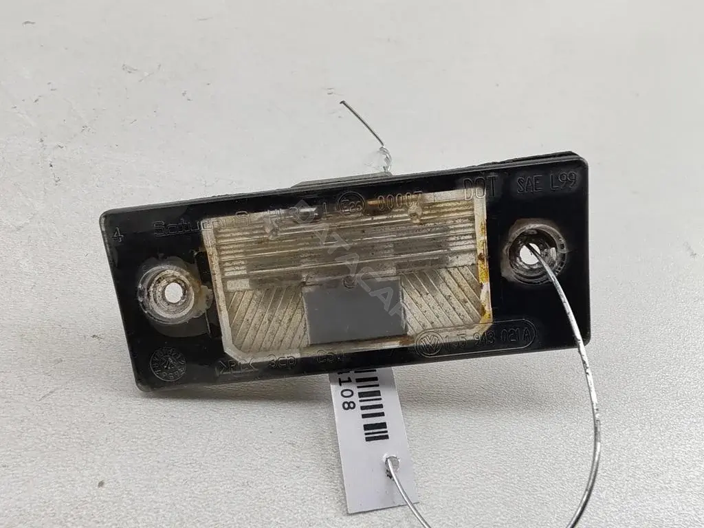 Фонарь подсветки номерного знака 1J5943021