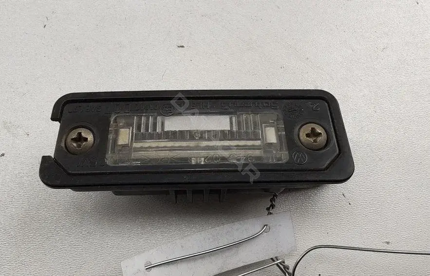 Фонарь подсветки номерного знака 1J6943021B