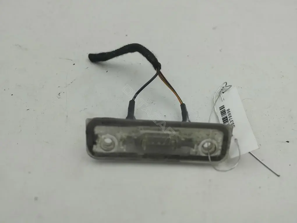 Фонарь подсветки номерного знака 96BG13550AB